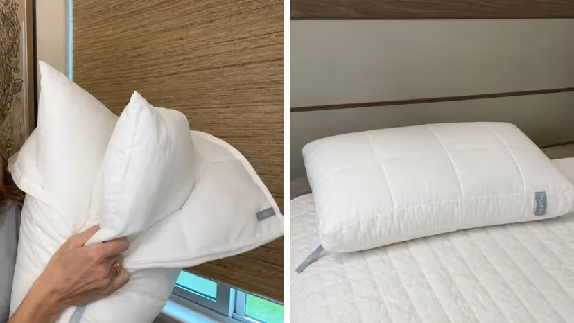 Hands fluffing and adjusting a white FluffCo pillow to show its supportive loft and customizable height for side sleeping